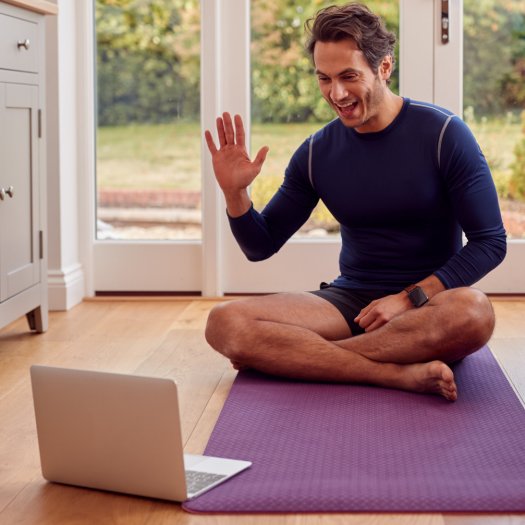 Darren Main teaching a yoga class over Zoom