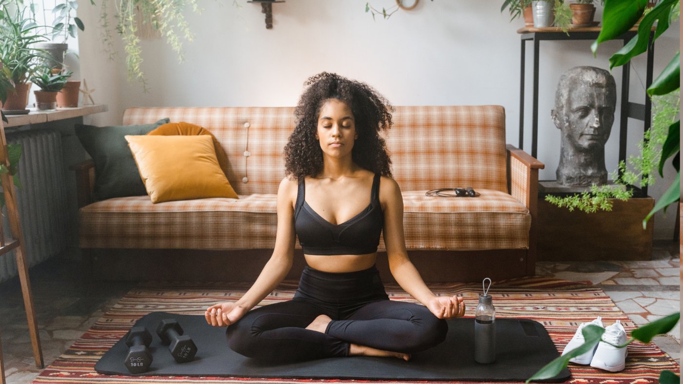 Woman meditating at home