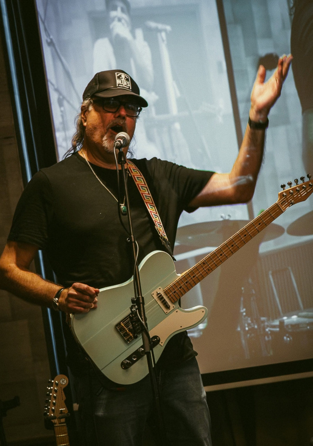 Greg Koch playing guitar at Guitar Dreams
