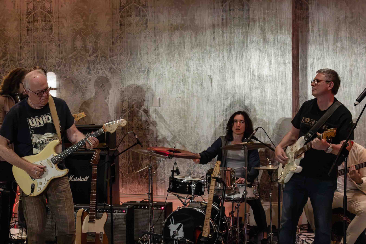 Guests and artists jamming together on stage