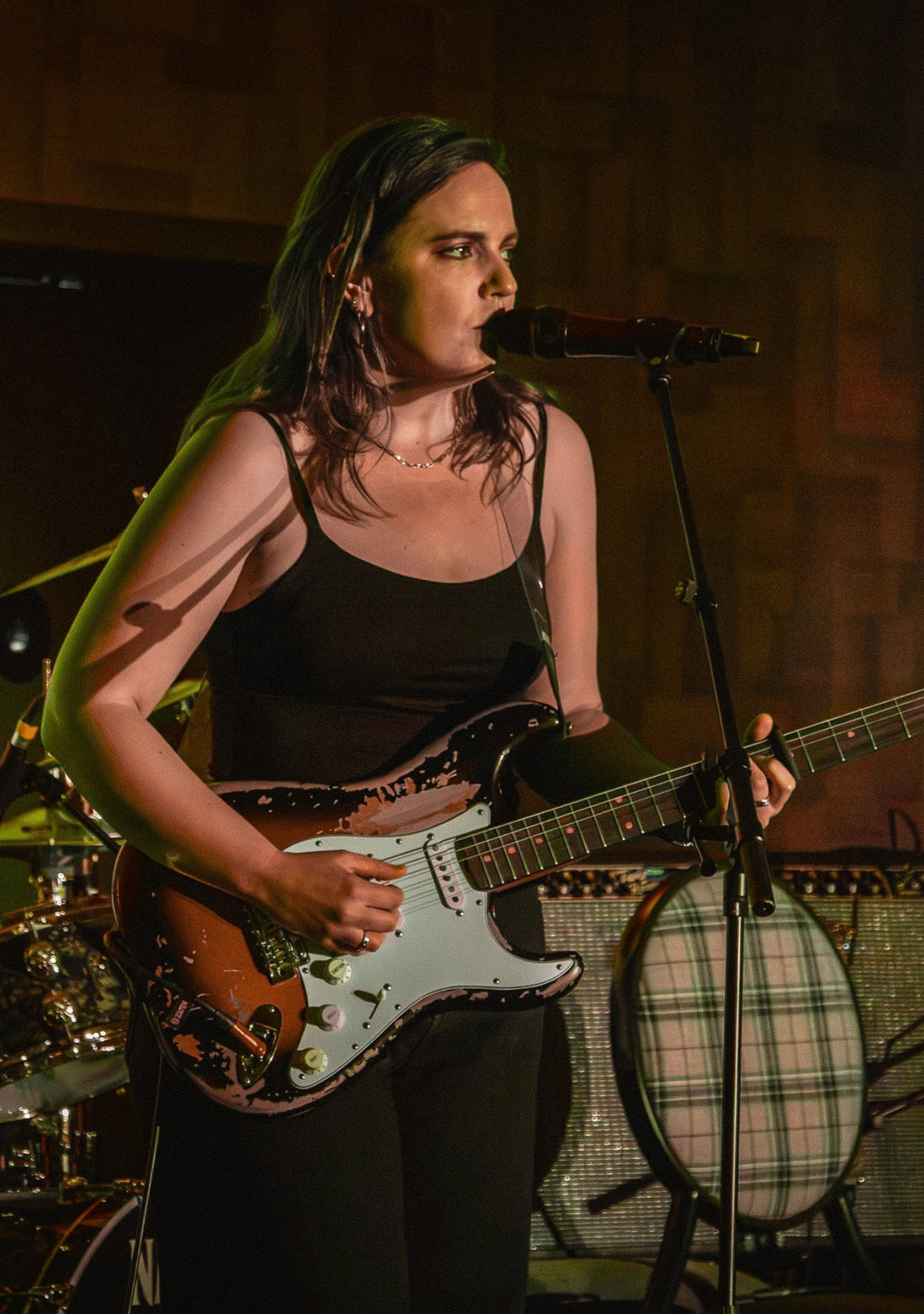 Mary Spender playing guitar at Guitar Dreams