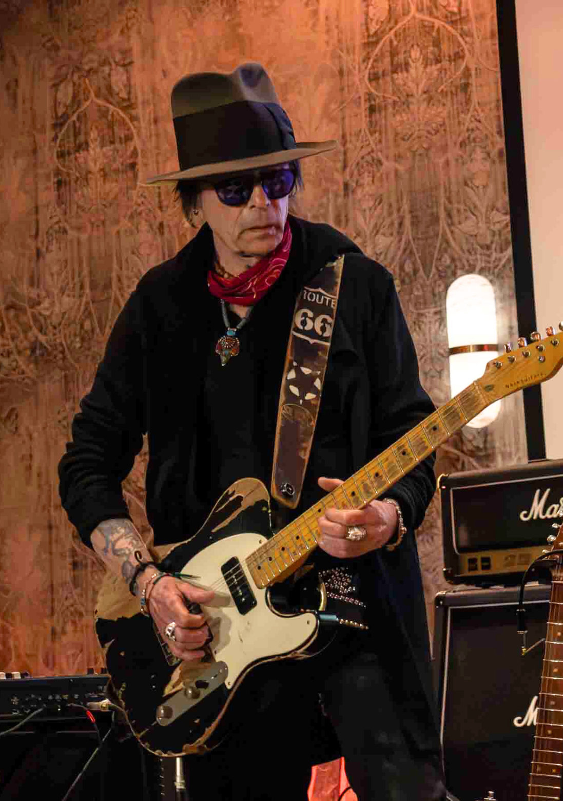 Earl Slick playing guitar at Guitar Dreams