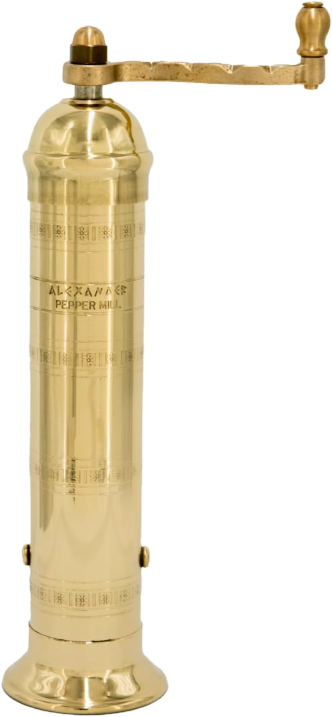 Polished brass pepper mill with a crank handle