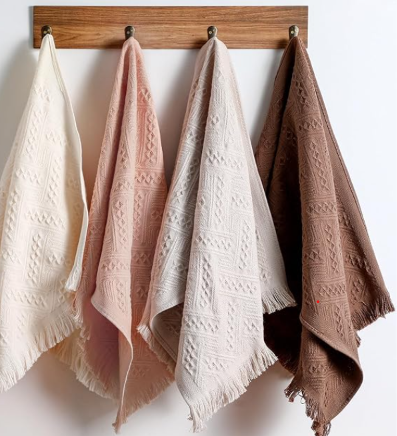 Four neutral boho hand towels
