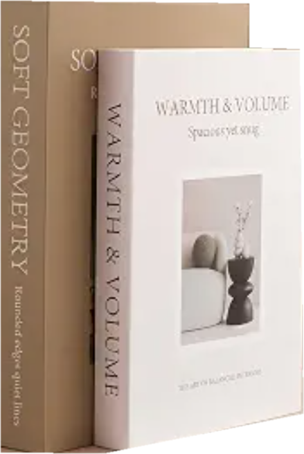 Two neutral decorative books in tan and white
