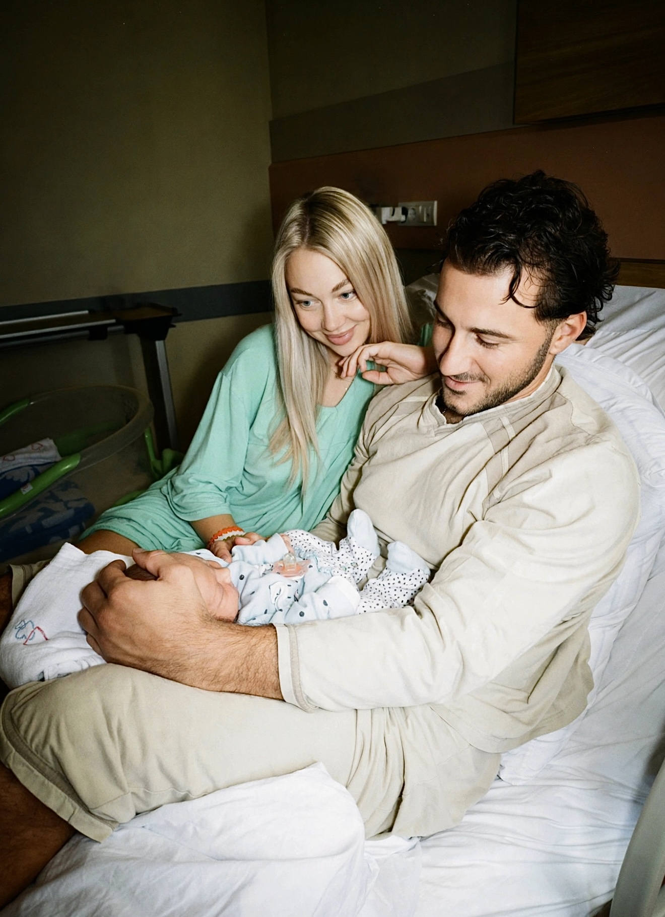 Michael and Liana holding Ella