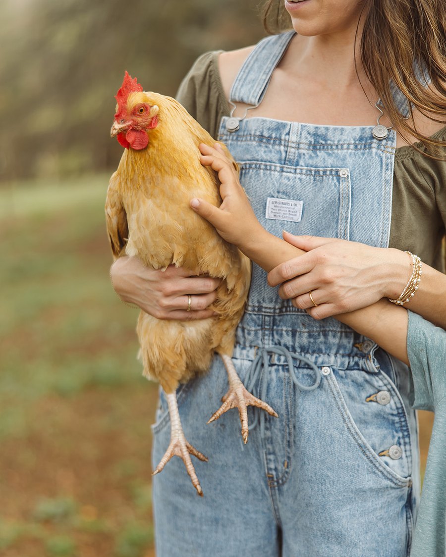 Selina holding one of her hens