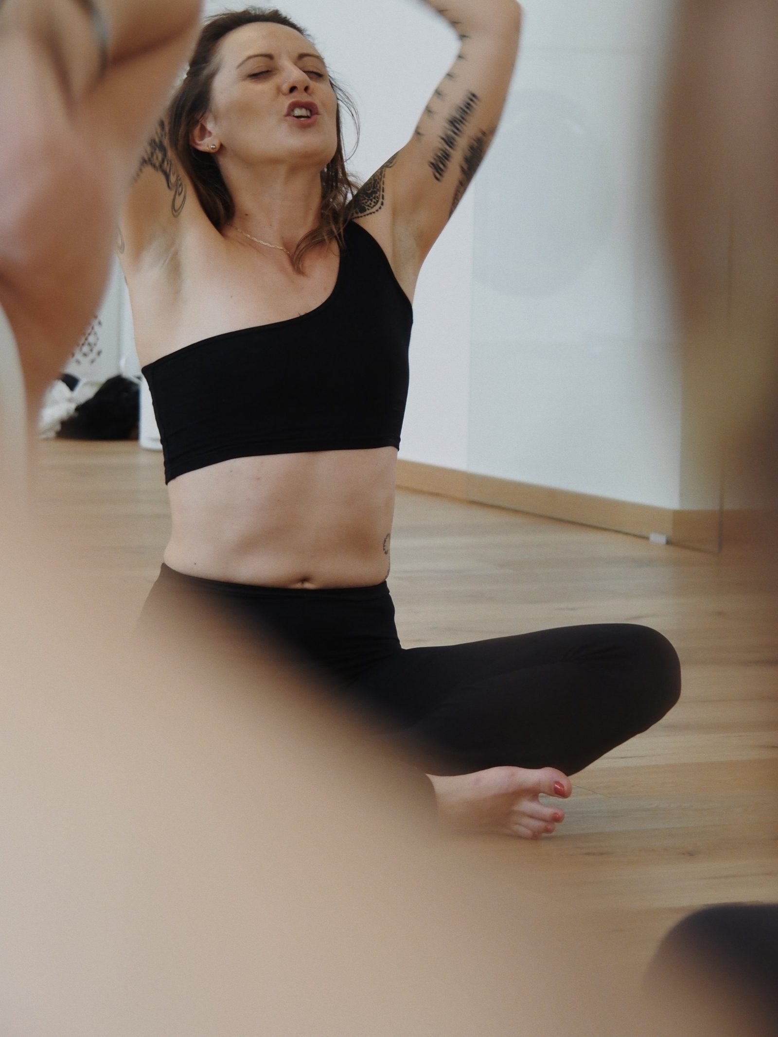 Alexia seated, breathing and chanting