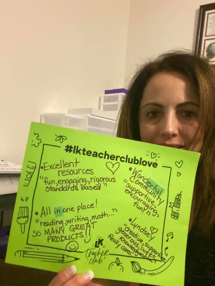 Tina holding a handwritten #lkteacherclublove sign