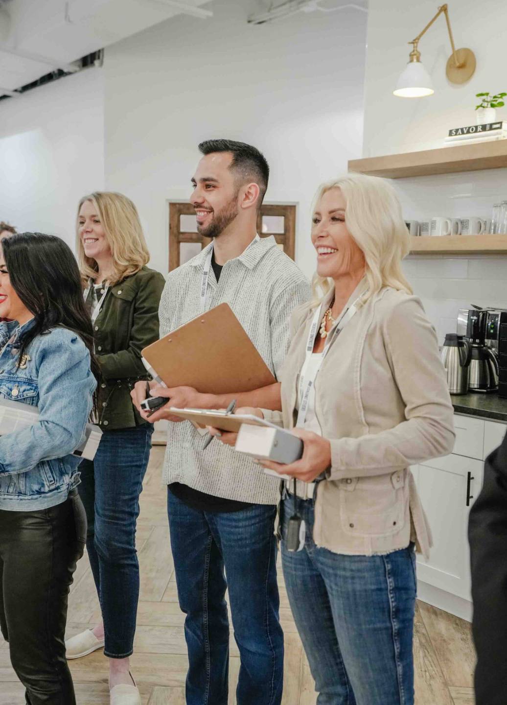 Home staging professionals participating in hands-on training at Staging Studio
