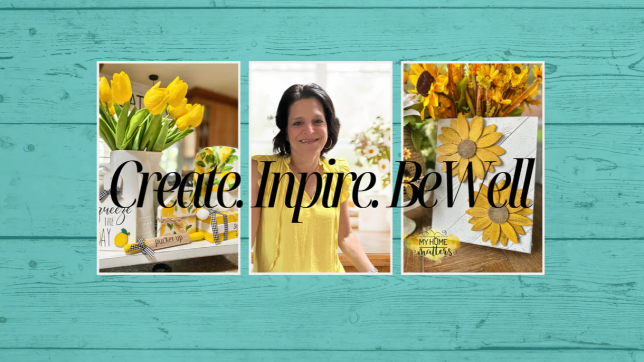 Laura Kleber of My Home Matters stands between DIY home décor projects featuring bright yellow flowers and handcrafted sunflower designs with the text "Create. Inspire. Be Well."