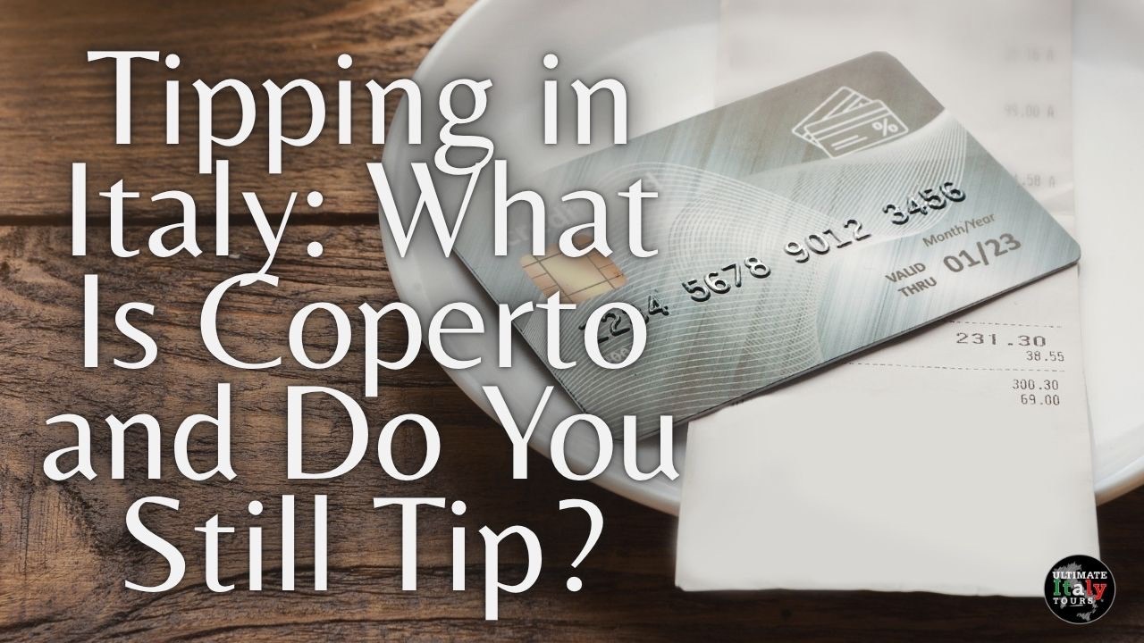 Credit card and restaurant receipt on a white plate, with the title “Tipping in Italy: What Is Coperto and Do You Still Tip?”