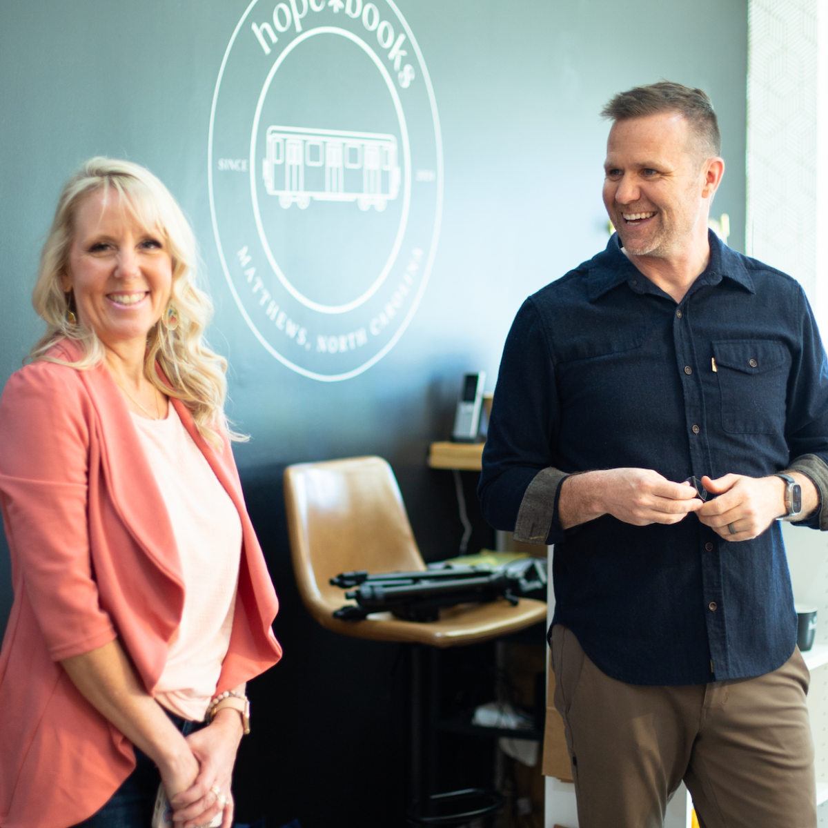 Brian Dixon with an author at the Hope Books studio
