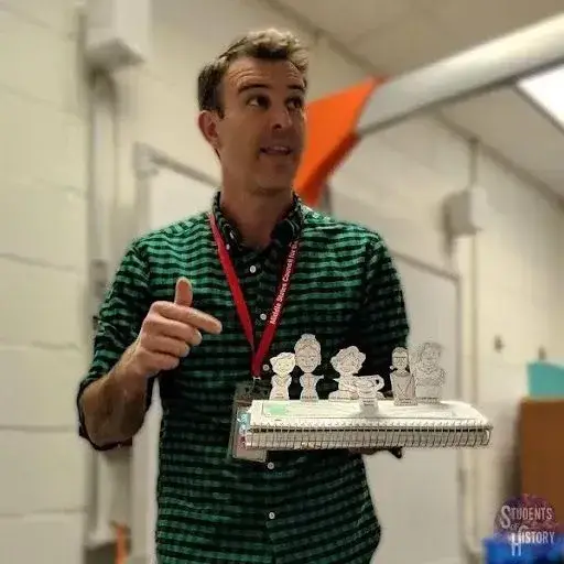 Teacher instructing with interactive digital resources