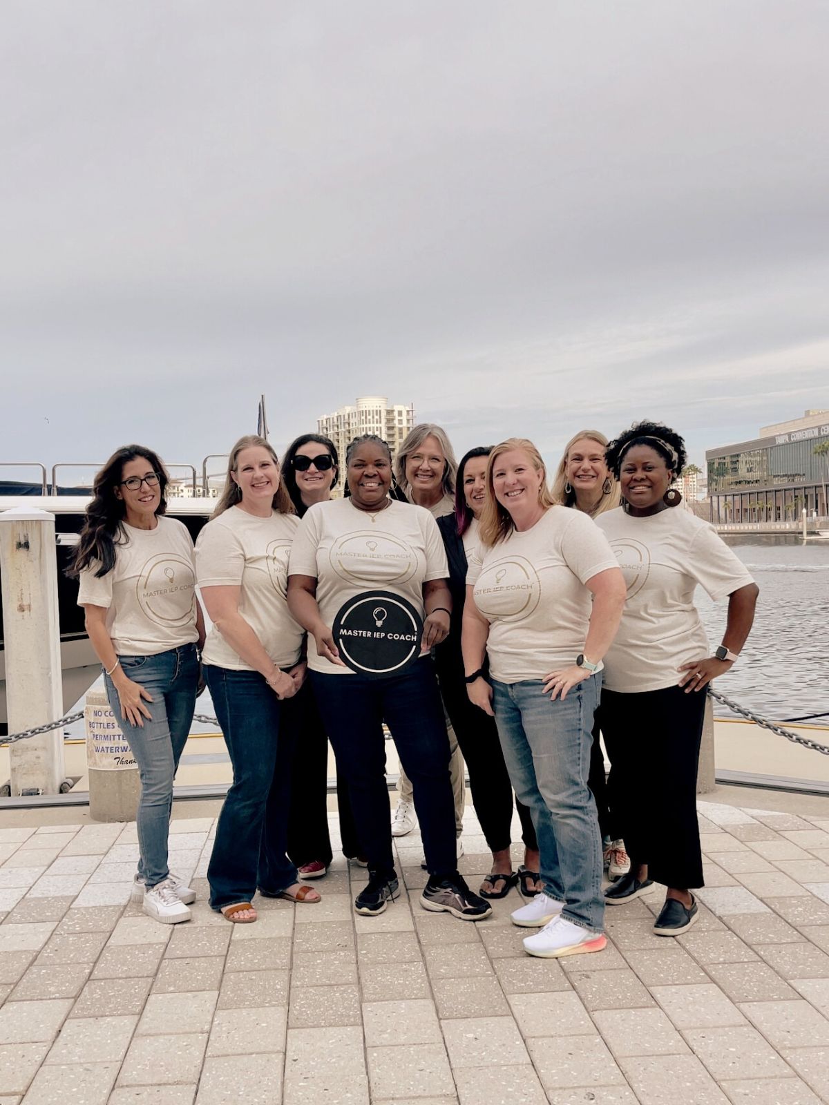 Master IEP Coaches together at a retreat by the water