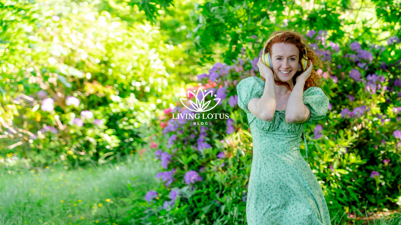 Woman in green dress holding her ears