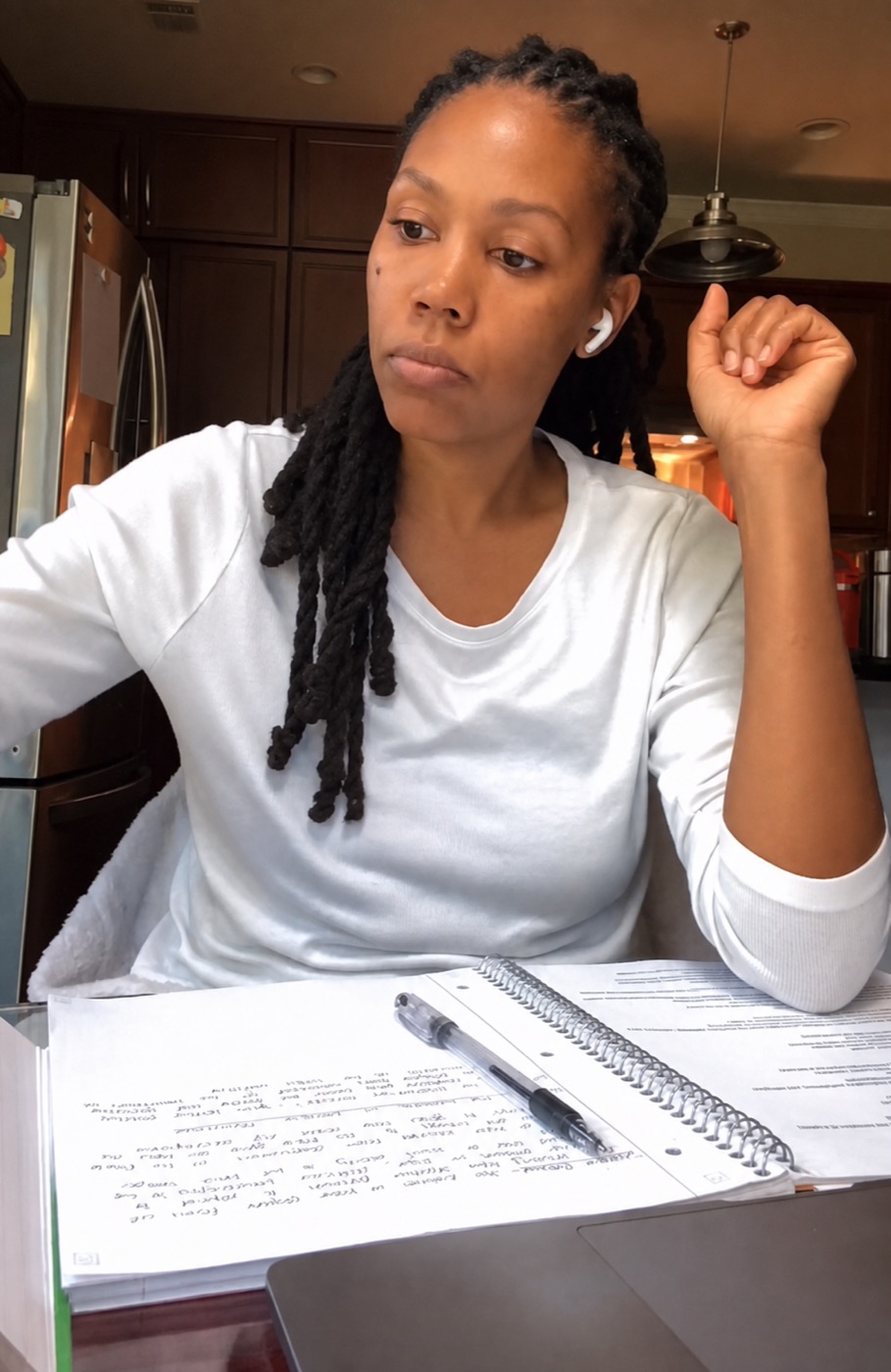 Selima Iwilla Harleston Lust studying at her kitchen table