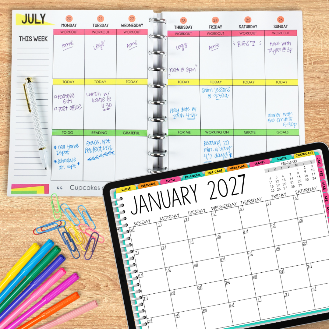 A printed weekly life planner page next to a tablet showing a January 2027 calendar, with colorful pens and paper clips