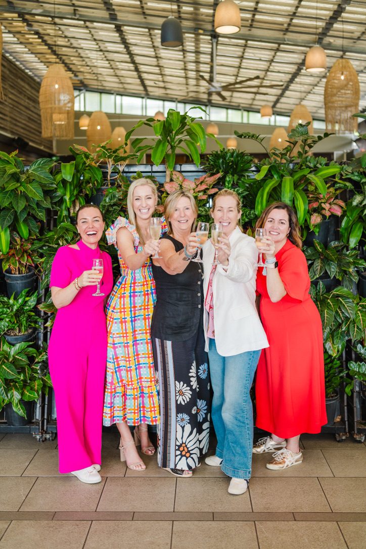 Her Empire Builder members together at an event