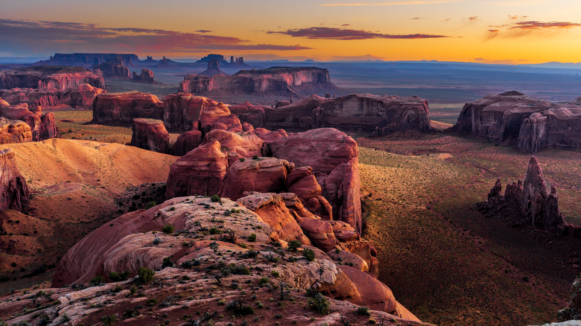 Sunset view from Hunts Mesa overlooking Monument Valley