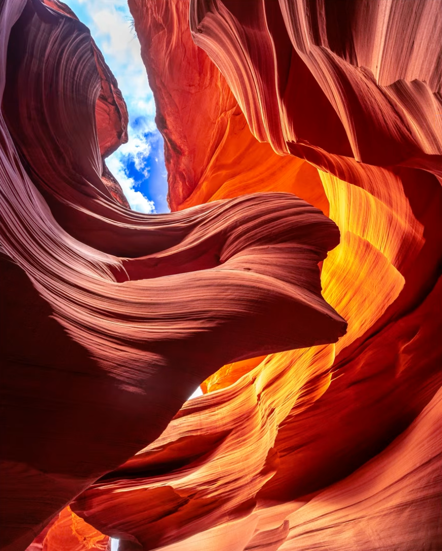 The same Antelope Canyon scene graded with rich, natural warm tones instead