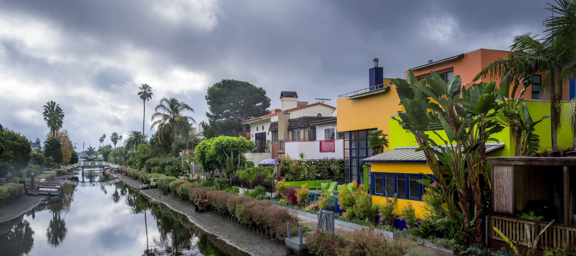 Retouched photo of colorful Venice Canals houses, orange and yellow facades