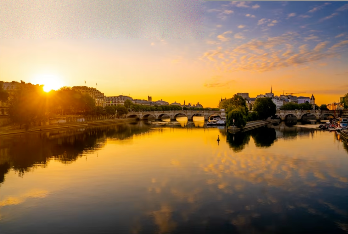 An over-edited, oversaturated sunrise over the Seine in Paris