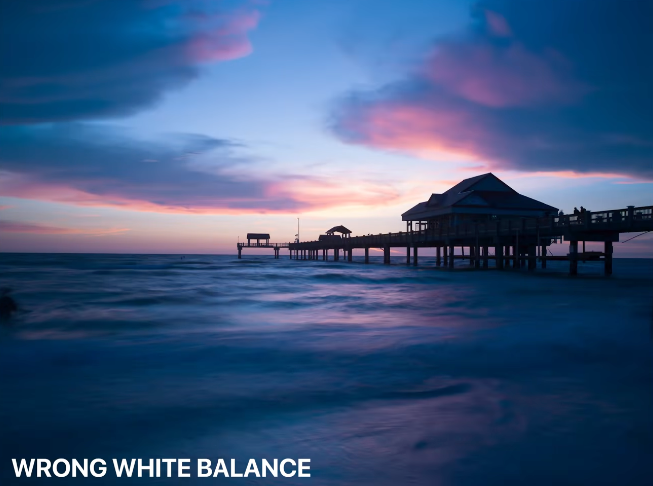 A pier sunset photo with the wrong, too-cool white balance