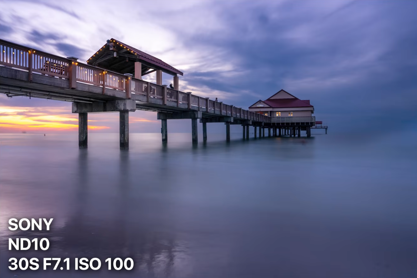Camera settings for a long exposure sunset photo: 30 seconds, f/13, ISO 100