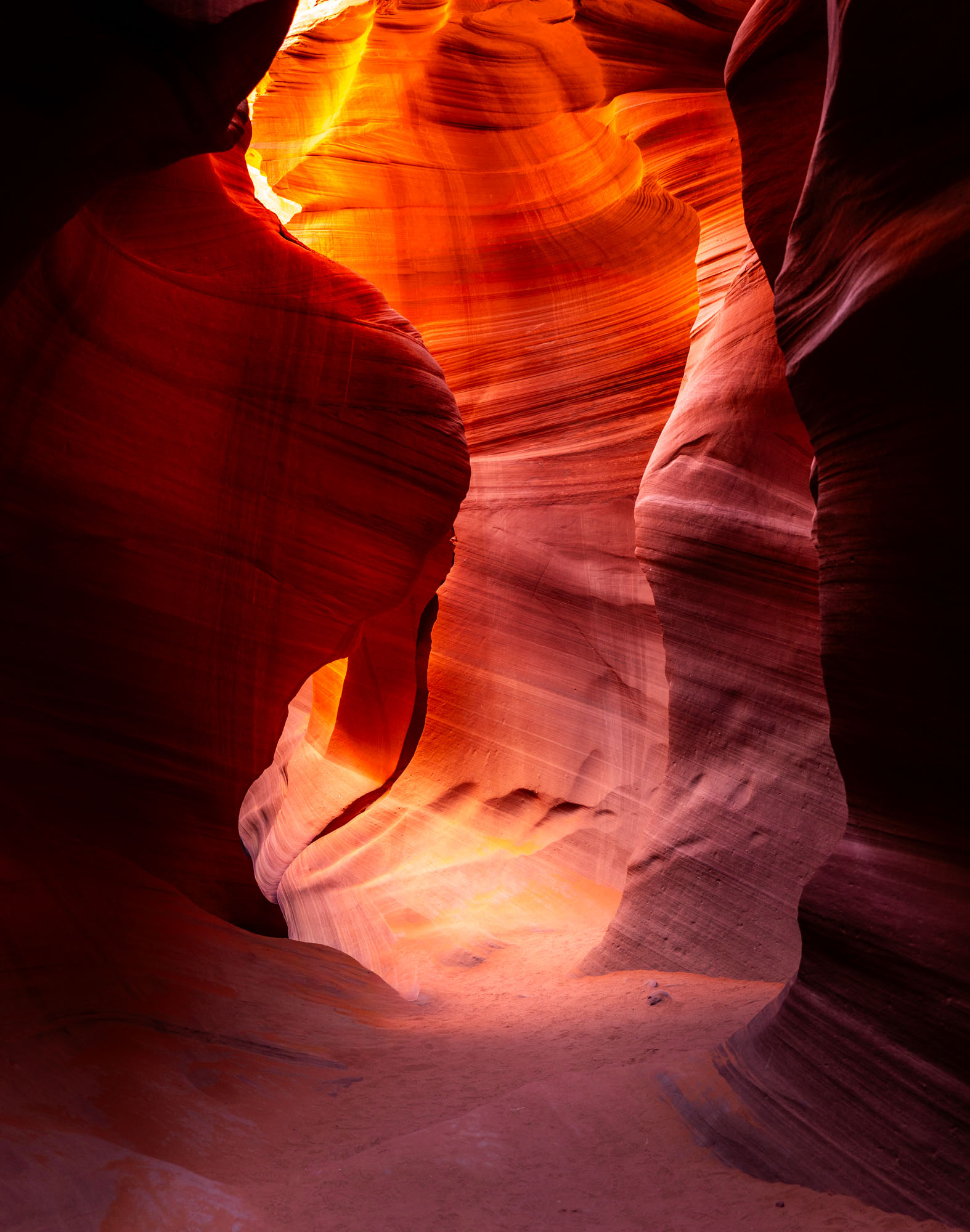 Glowing light inside Lower Antelope Canyon slot canyon, Arizona