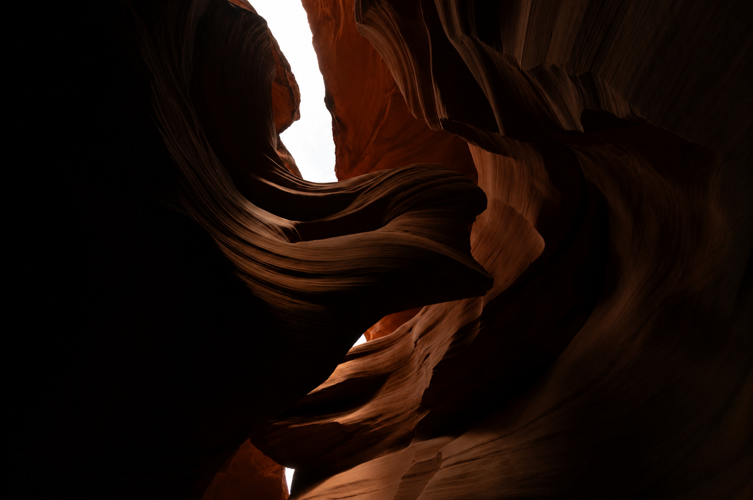 Antelope Canyon straight out of camera: dark, flat, with a blown-out sky at the top of the frame