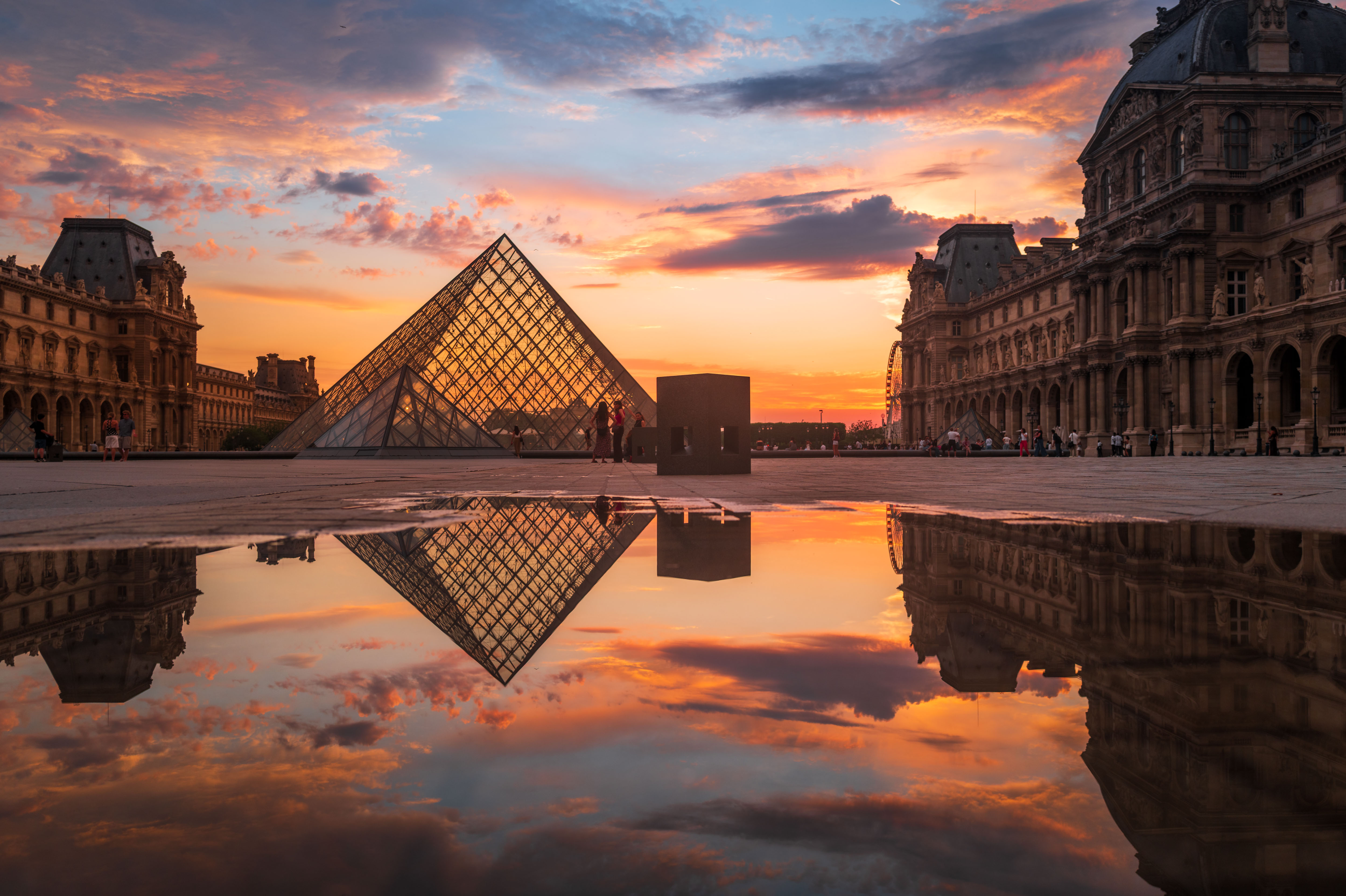 Louvre pyramid at sunset with reflection in Paris by Serge Ramelli