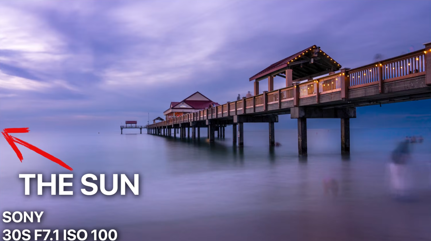 A pier sunset photo with the sun cropped out of frame, labeled as a boring result