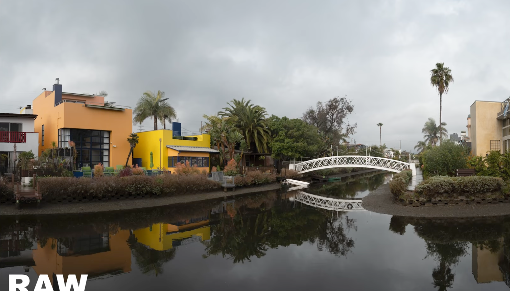 RAW, unedited photo of a Venice Canals footbridge, flat overcast light