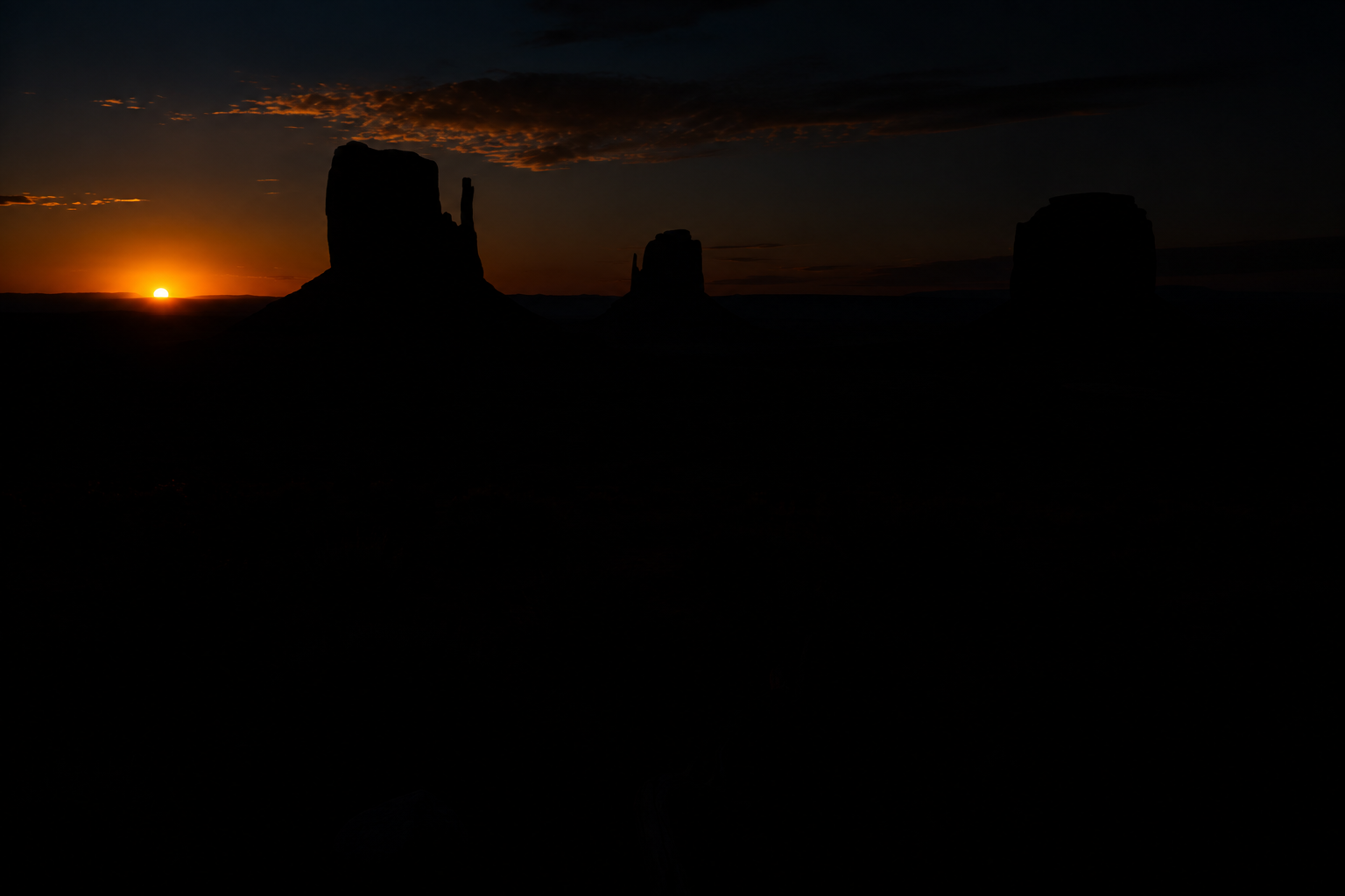 The Monument Valley Mittens at sunrise, RAW and underexposed straight out of camera