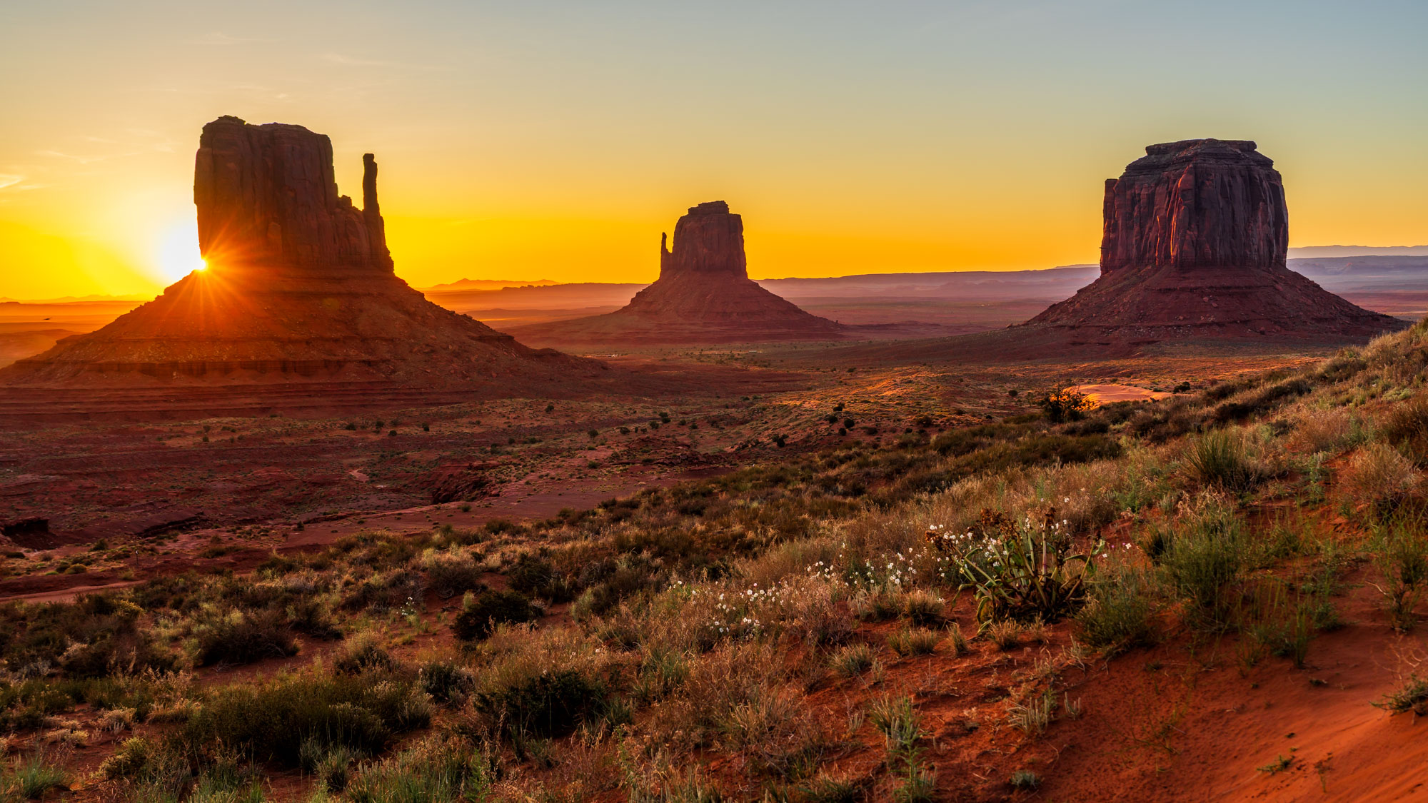 Sunrise over the Mittens in Monument Valley shot at ISO 100, f/6.3, 1/80s