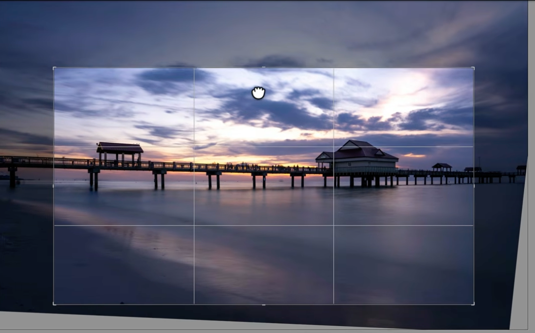Cropping the straightened pier sunset photo using a rule-of-thirds grid