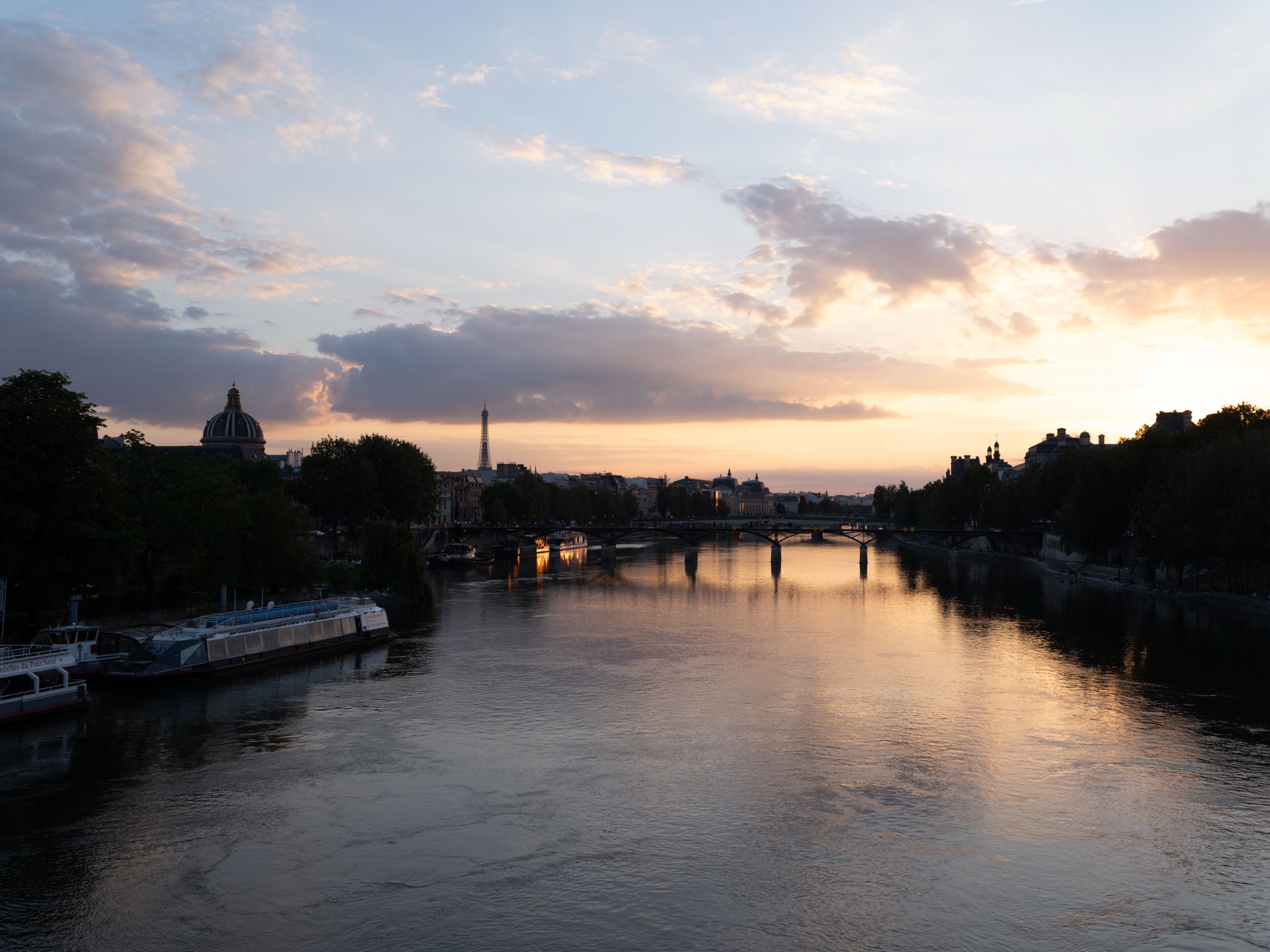 Before a Lightroom preset — flat RAW photo of the Seine in Paris at sunset