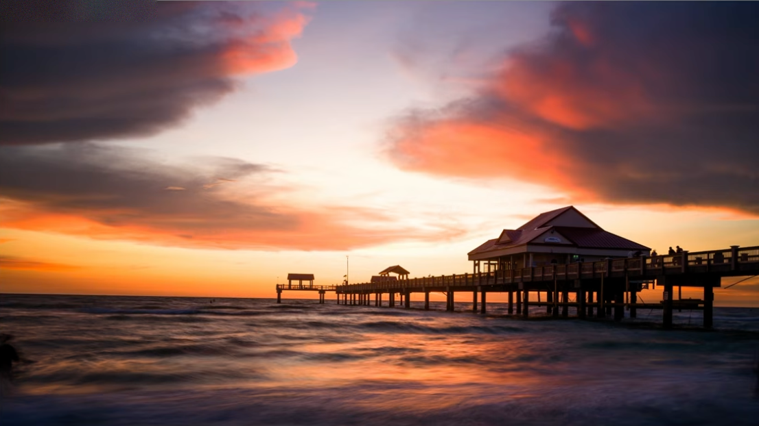 Smooth, pleasing water at a pier at sunset, using a slower shutter speed