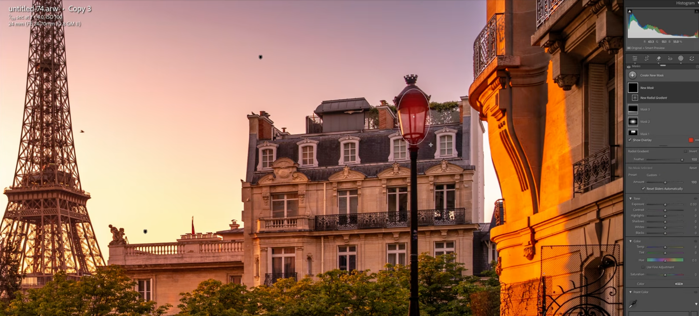 A Radial Gradient panel adding light around a street lamp near the Eiffel Tower in Lightroom