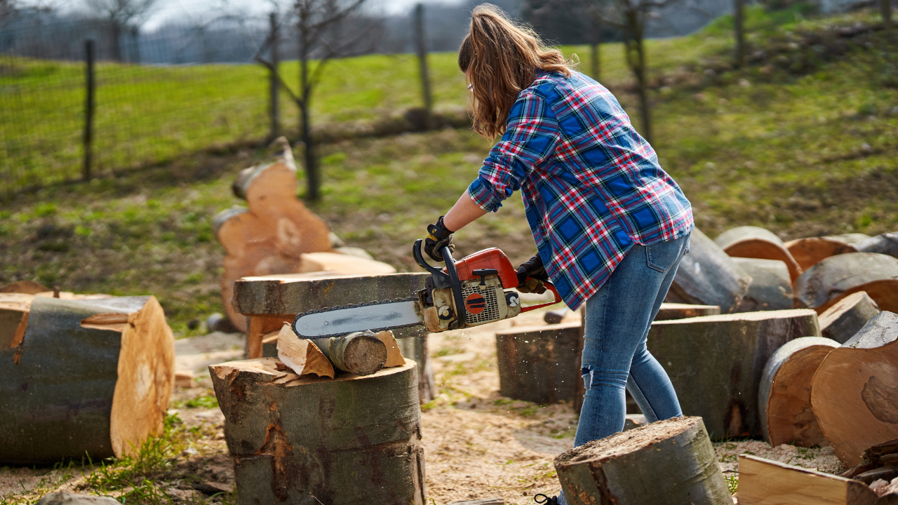 Woman with chainsaw