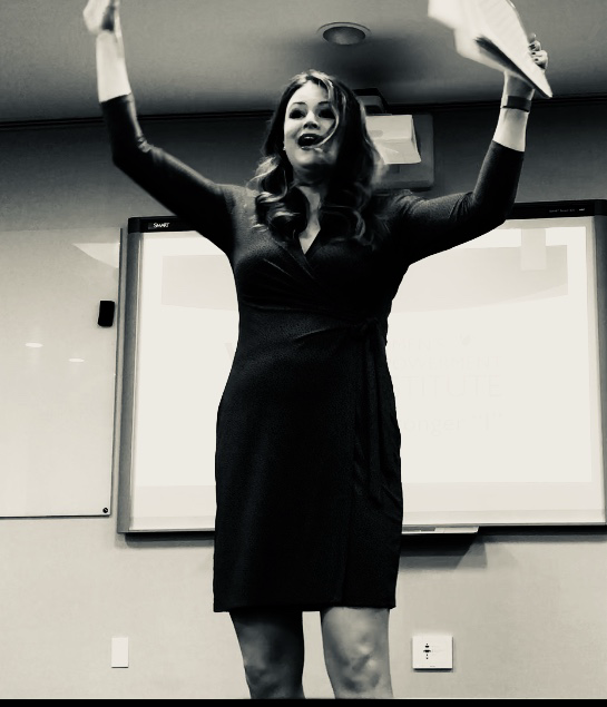 Melissa speaking at an event