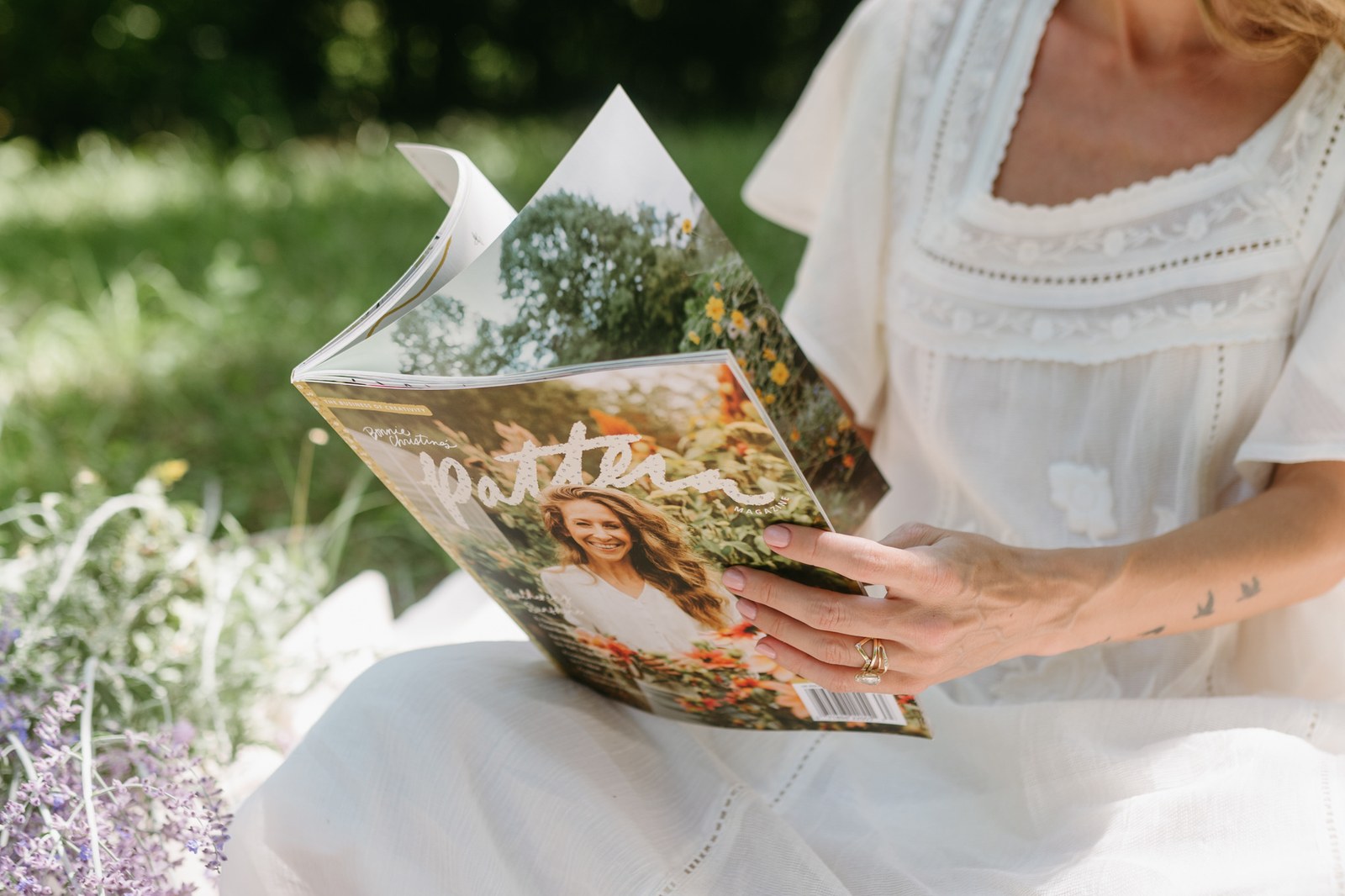 Reading Pattern Magazine on the lawn