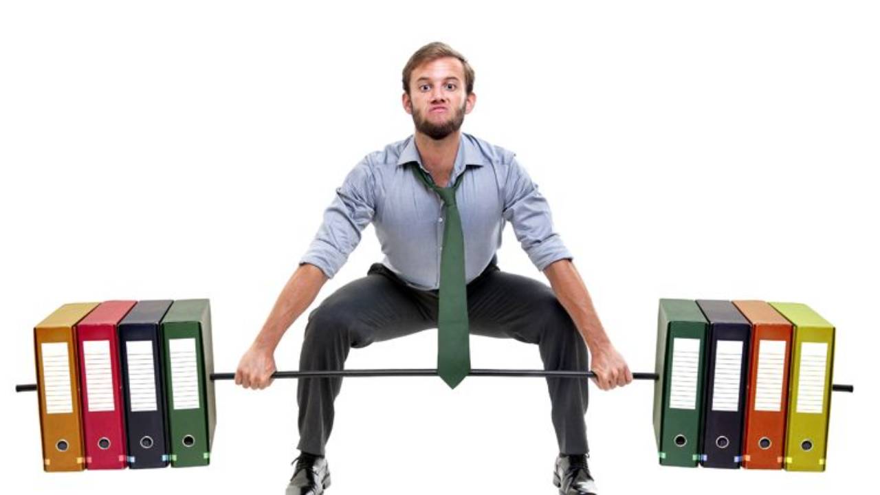 Man lifting weights made of 3-ring binders