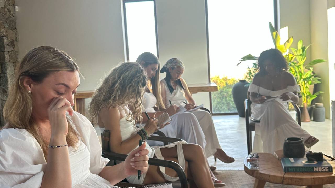 women seated together during a workshop