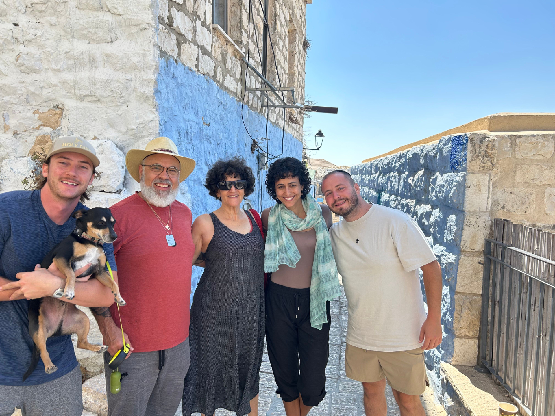 Group of Kabbalah retreat participants in the old city streets of Tzfat Israel
