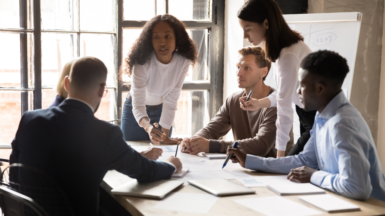 Leader providing employees professional training through an internal certification program