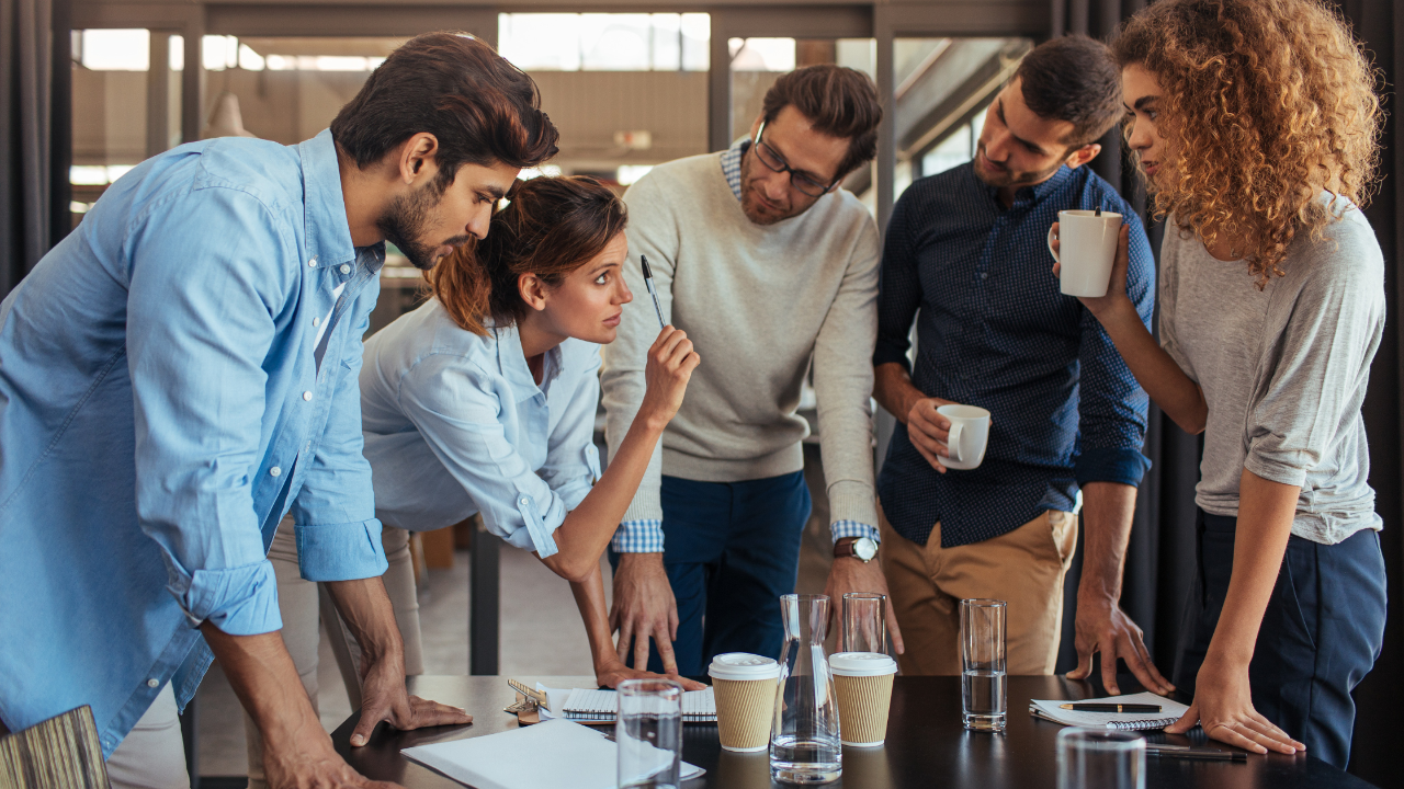 Leader assigning responsibilities to team members while setting clear goals and expectations