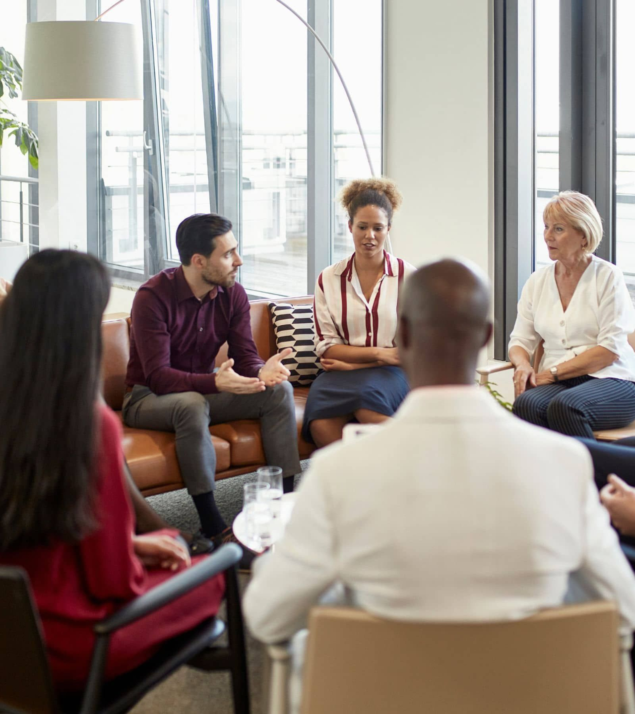 People engaged in a collaborative conversation