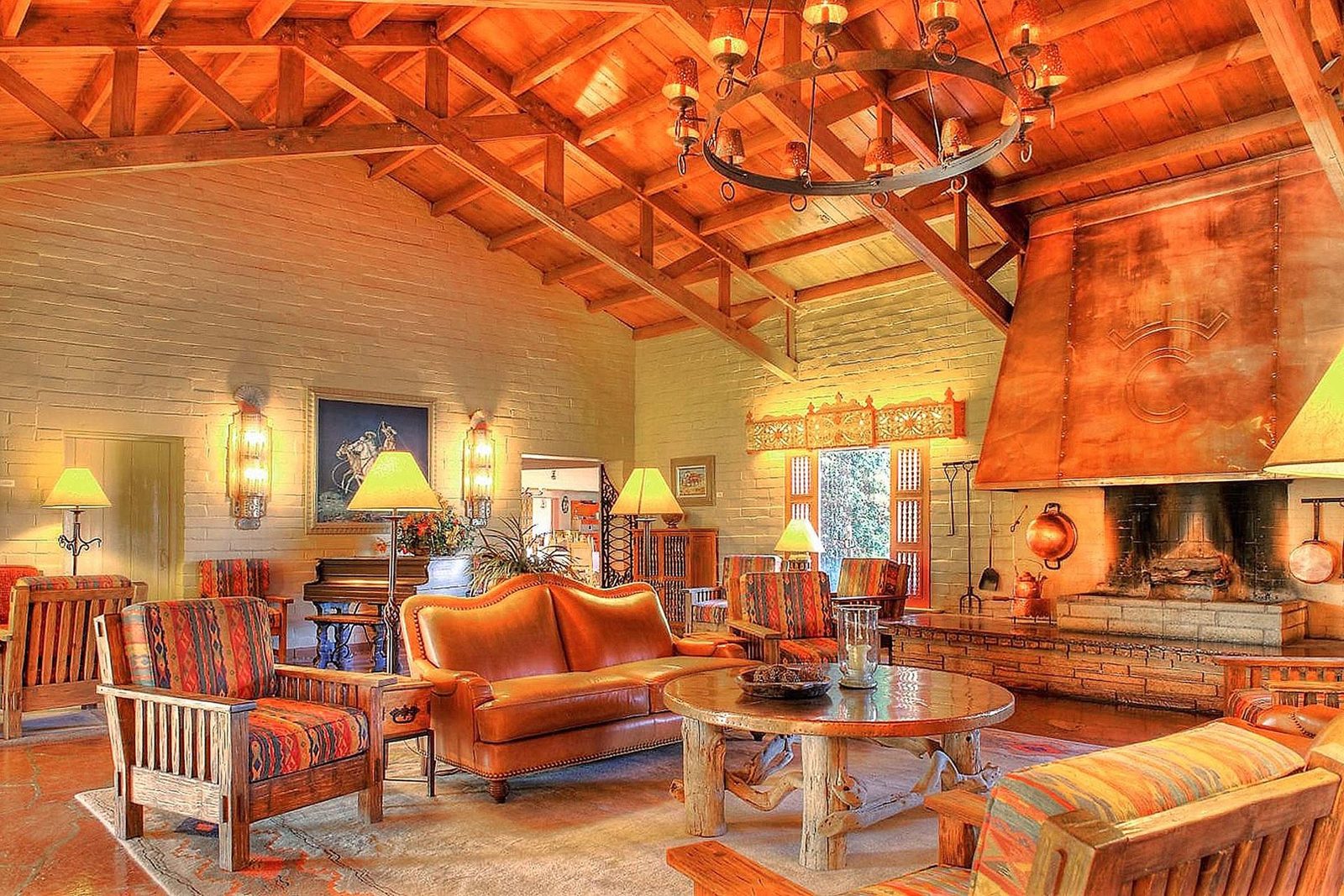 The adobe lobby and fireplace at Rancho de los Caballeros